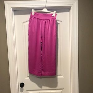 Pink Crosby high waist pants. Come down to mid calf  possibly ankle if shorter.